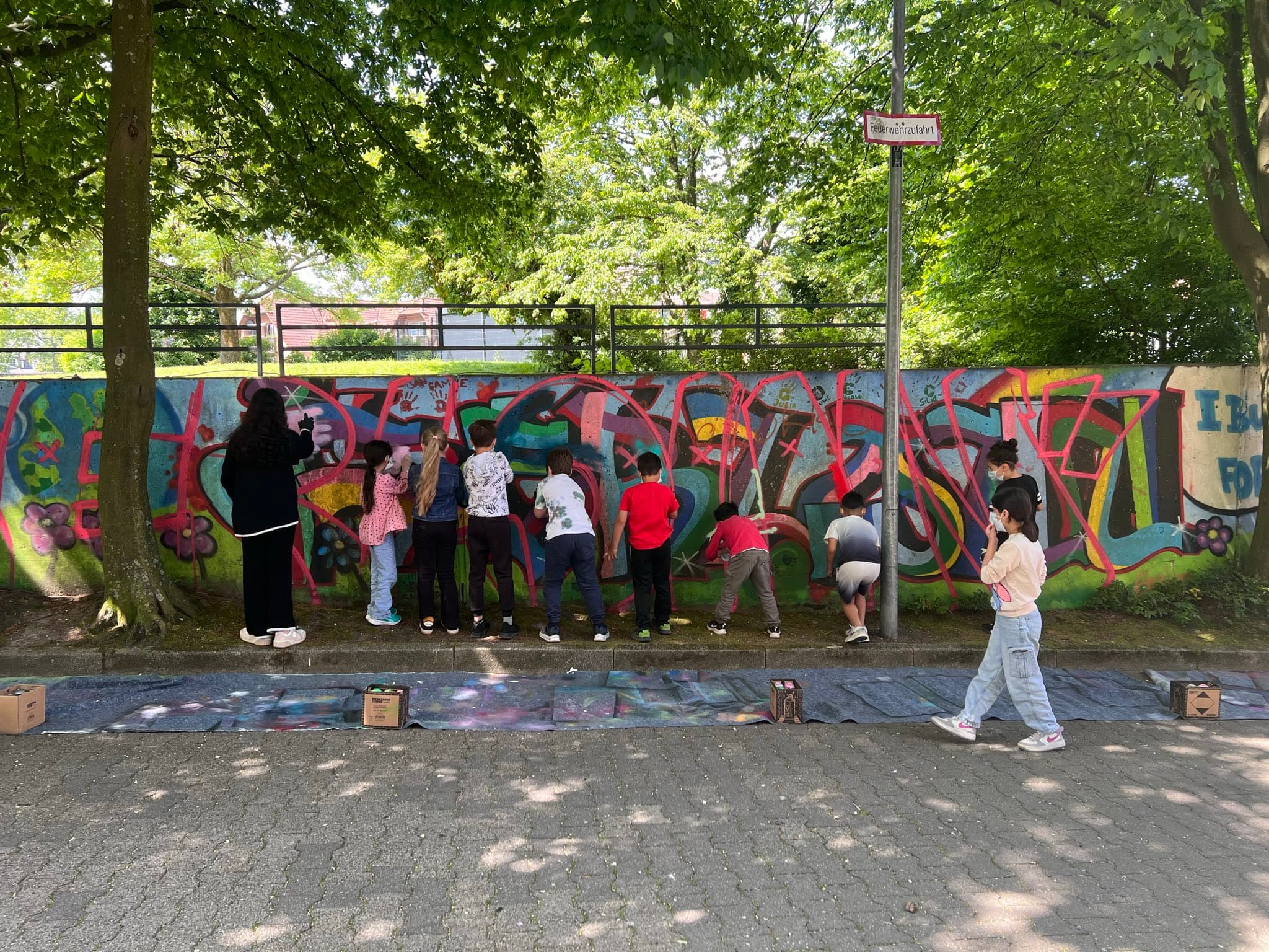 Frohet Viertel — Kinder beim Graffiti-Workshop